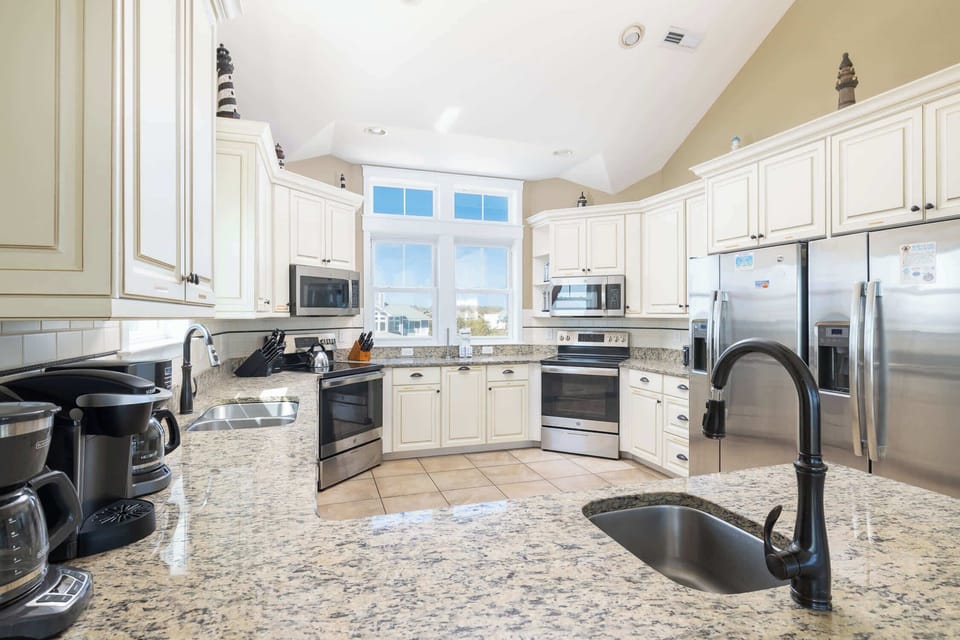 Bright, Fully Stocked Kitchen 