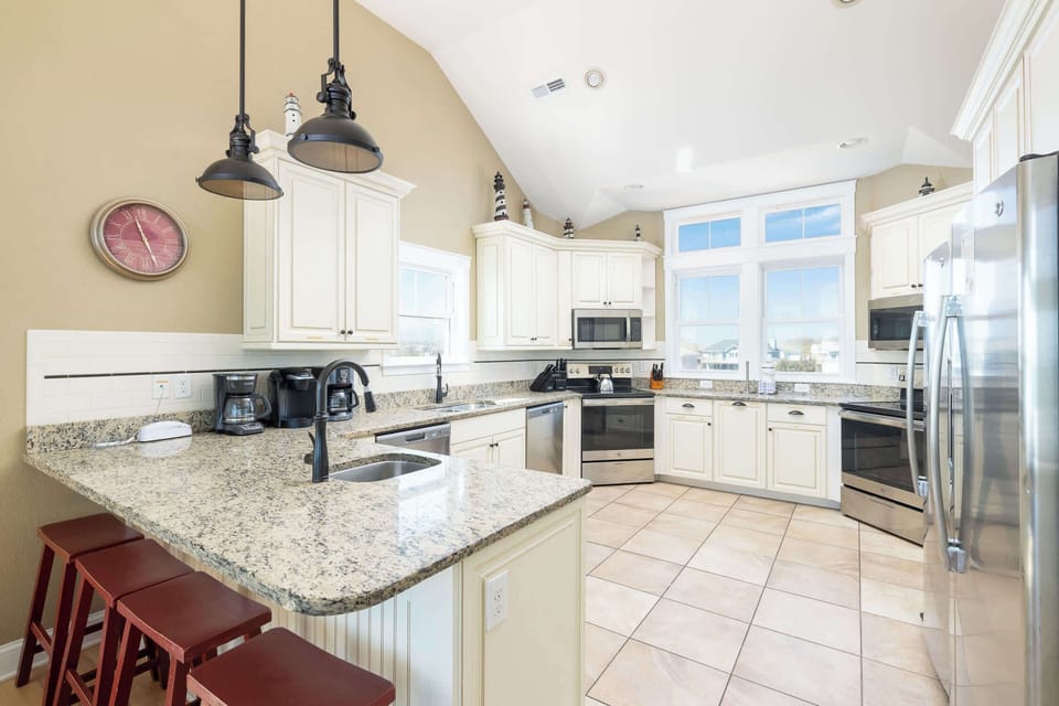 Bright, Fully Stocked Kitchen 