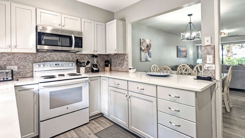 The kitchen is open to the dining room and living room.