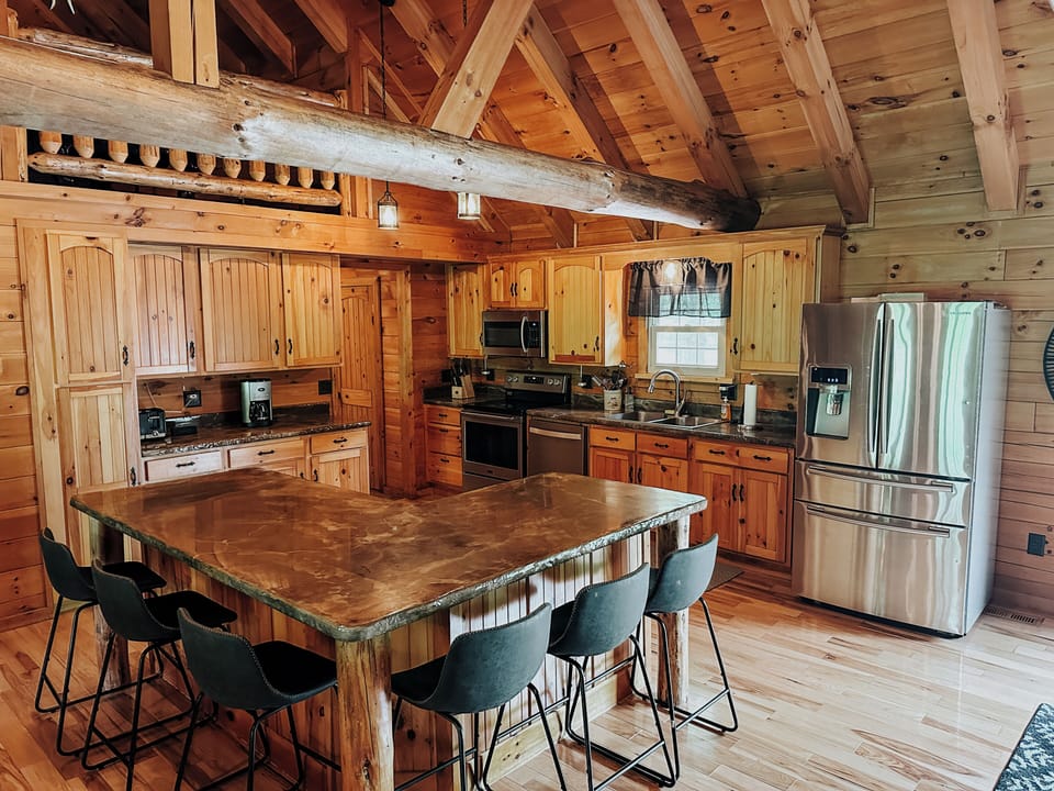 Fully stocked kitchen with induction stovetop and coffee provided.