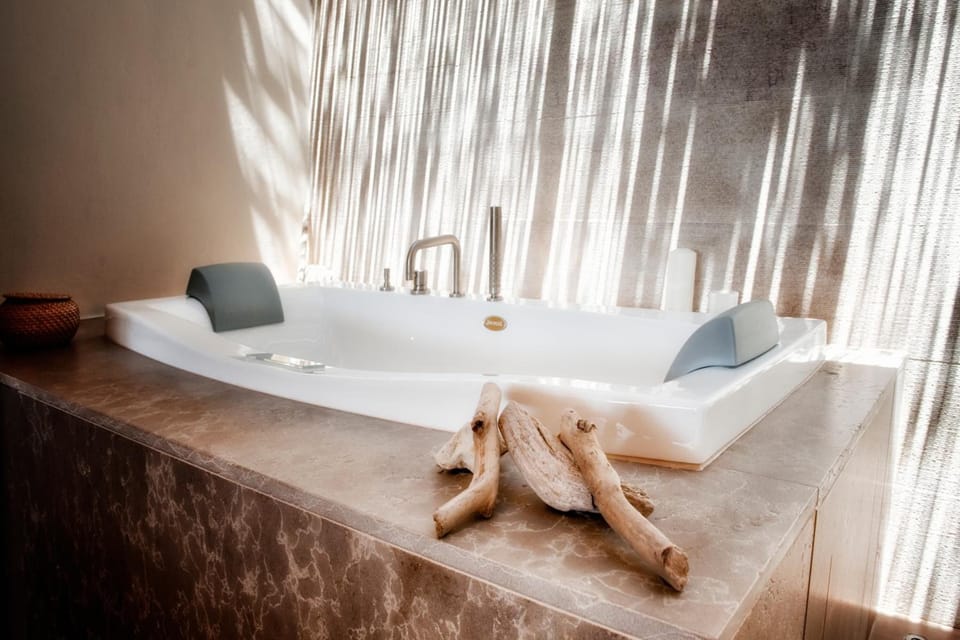 Shower, free toiletries, hair dryer, slippers