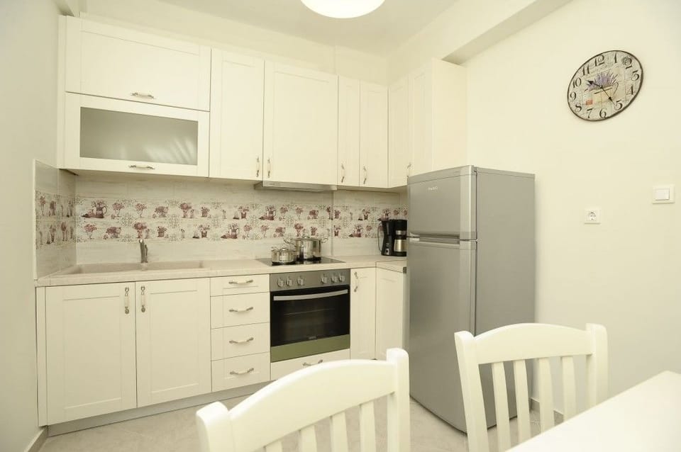 Family Villa, Beachfront | Private kitchen | Full-size fridge, stovetop, coffee/tea maker, electric kettle
