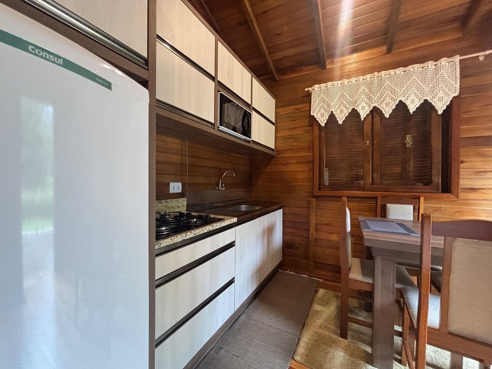 Chalet | Private kitchen | Fridge, microwave, cookware/dishes/utensils