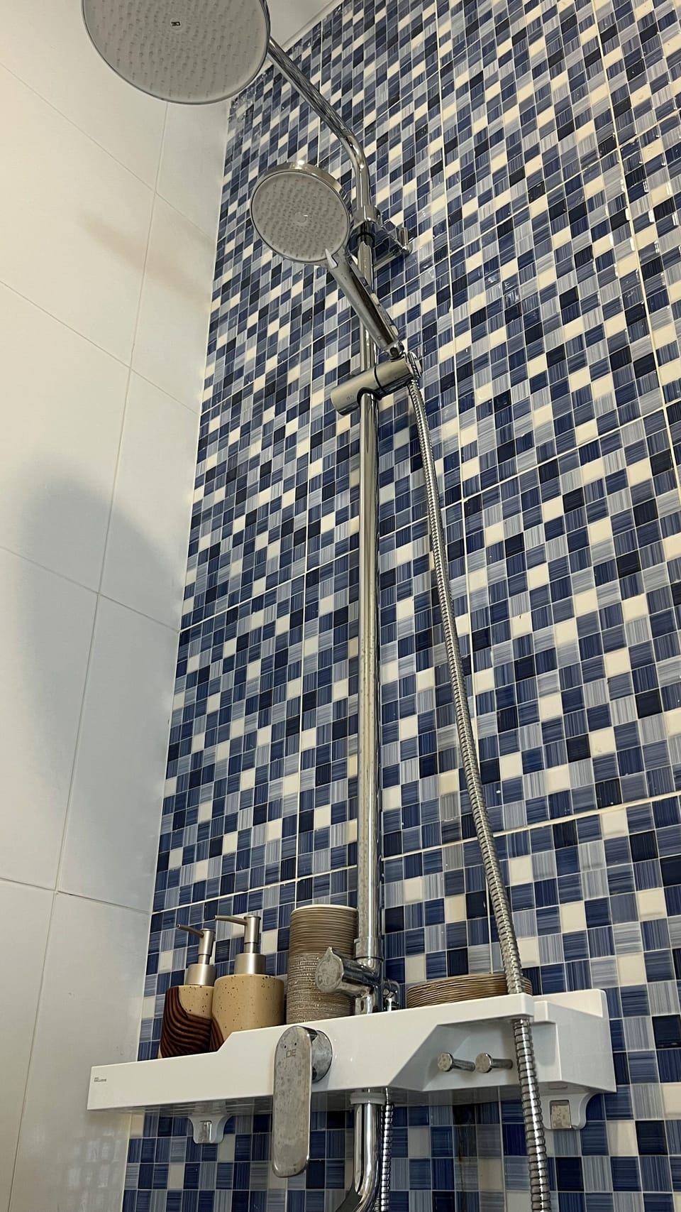 Shower, rainfall showerhead, towels, soap