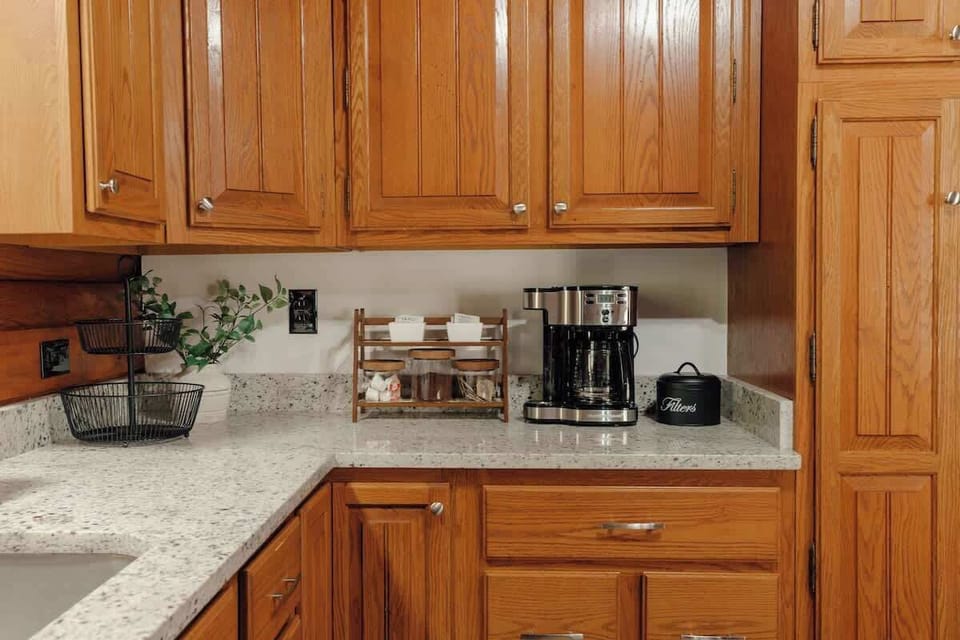 Additional kitchen prep area with coffee station, generous storage, and modern finishes—designed to make cooking and hosting large groups easy.
