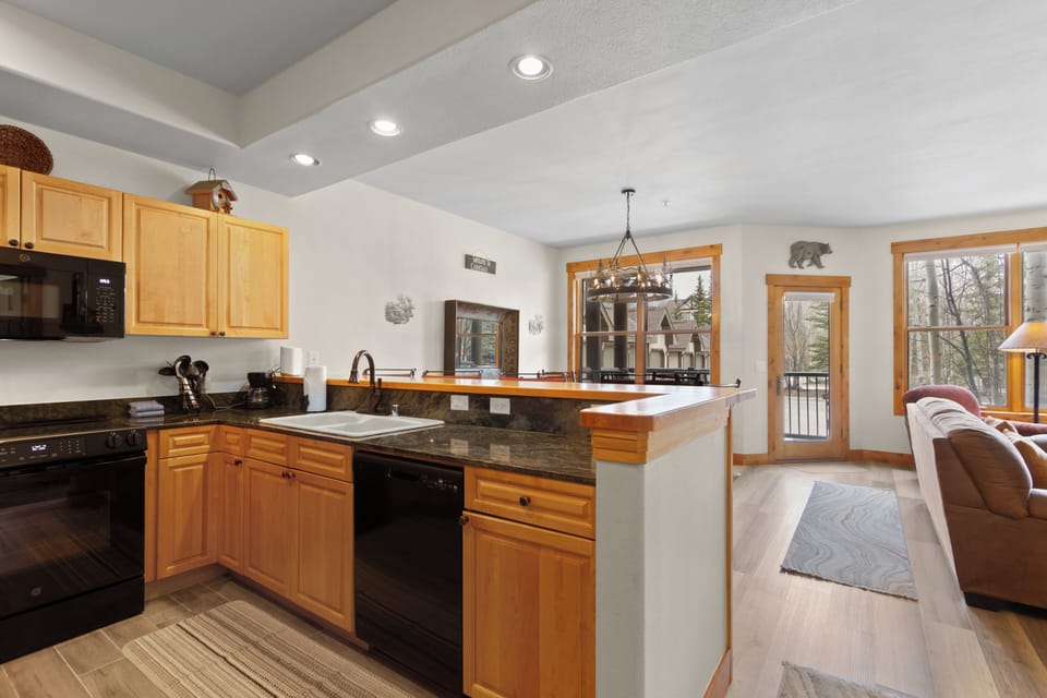 Spacious full kitchen with quality appliances and generous prep space.