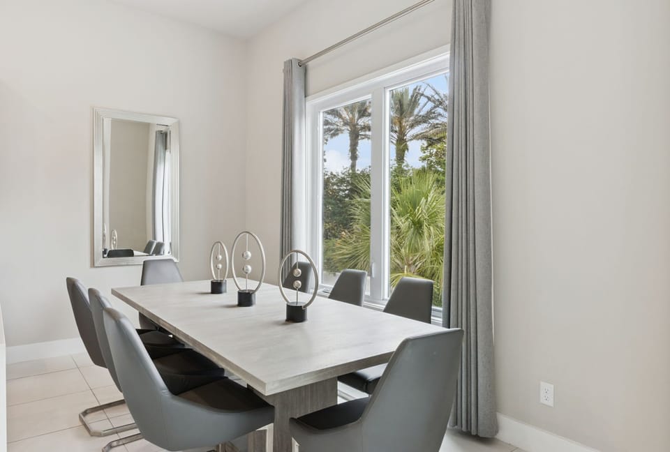Enjoy meals together in this sleek modern dining space