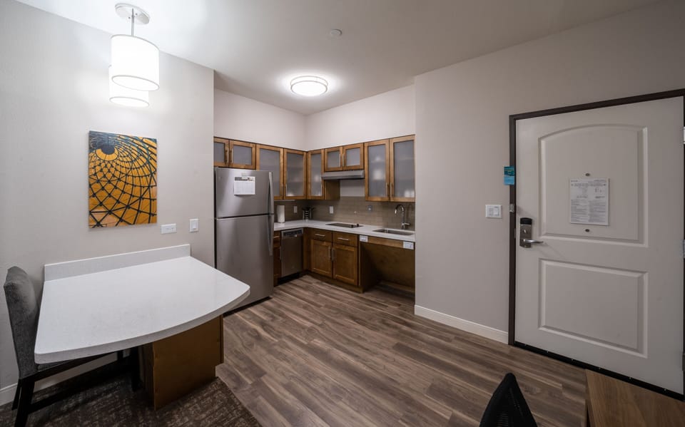 Experience an open kitchen area with stylish fixtures, perfect for culinary adventures and casual meals.