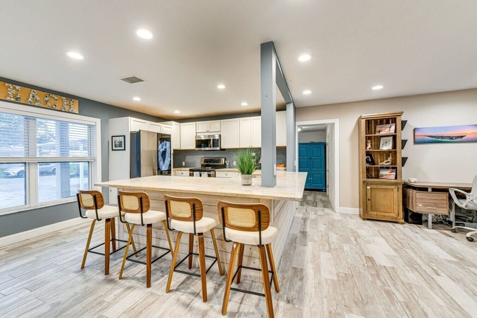 Kitchen | Breakfast Bar & Stainless Steel Appliances | Open Layout & Workspace Access