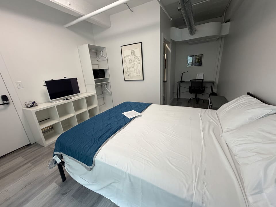Desk, laptop workspace, WiFi (free), bed sheets