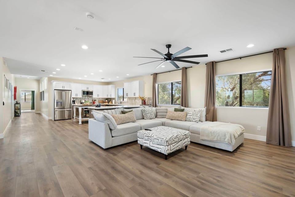 Open floor plan connects living, dining, and kitchen areas. Unit 2.