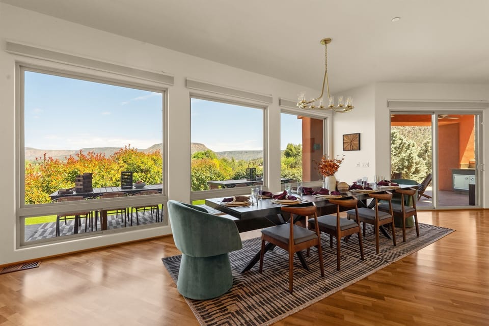 Enjoy meals with a breathtaking backdrop. Three massive picture windows flood the dining space with natural light and frame the beautiful Sedona landscape perfectly.