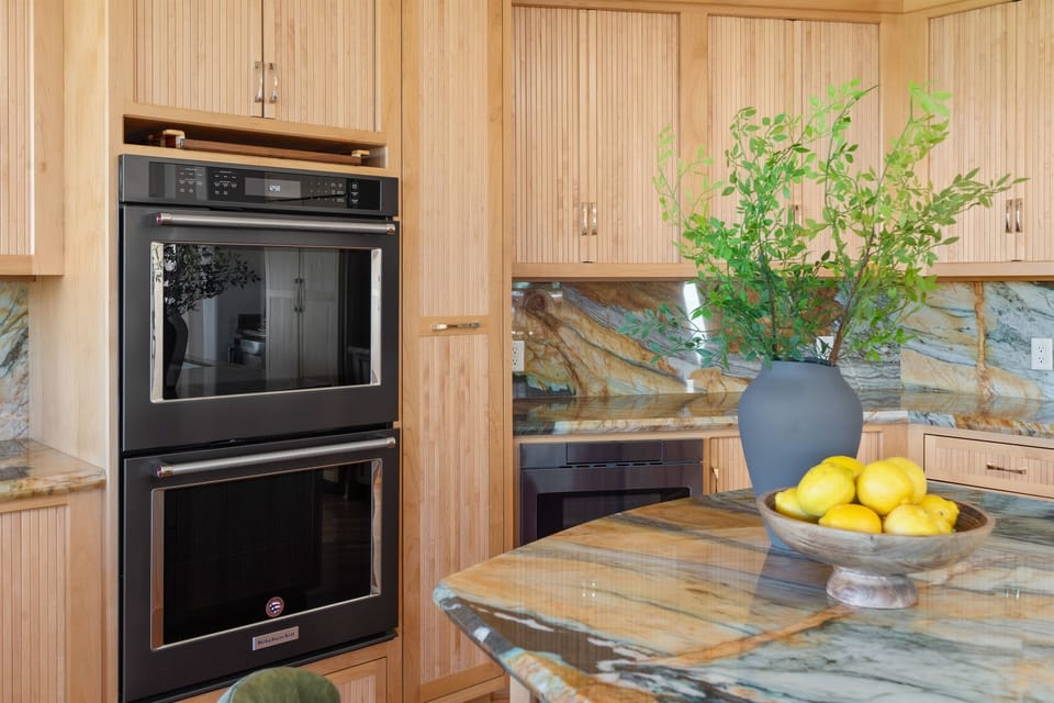 A true culinary retreat featuring top-tier appliances, gorgeous stone finishes, and all the prep space your group needs.