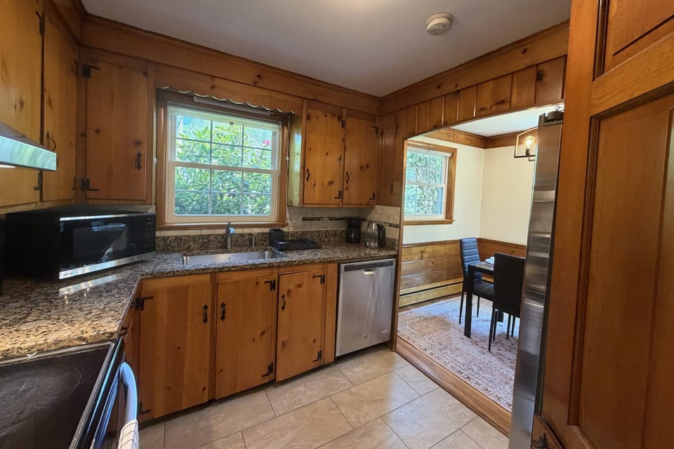 Fully equipped kitchen with stove, oven, and dishwasher