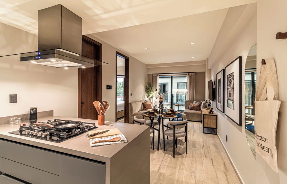 Superior One Bedroom Apt | Living area | 55-inch plasma TV with digital channels