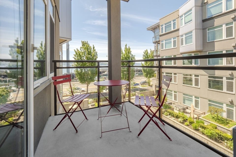 Private balcony with bistro seating.