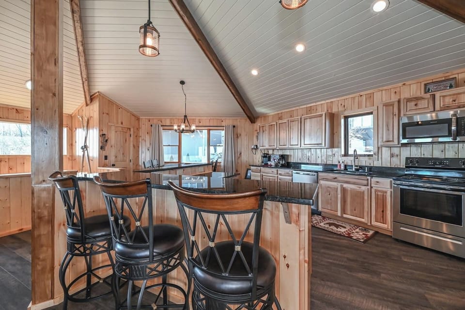 A charming coffee bar and winter-ready mudroom welcome guests in from the cold. Store your gear, grab a warm drink, and settle into mountain life.