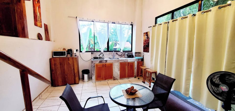Apartment, 1 Bedroom, Patio | Living room | Books