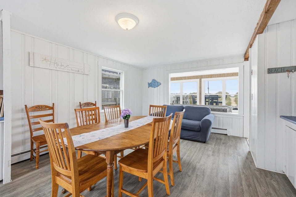 Dining table with extra seating, offering a comfortable and flexible space
