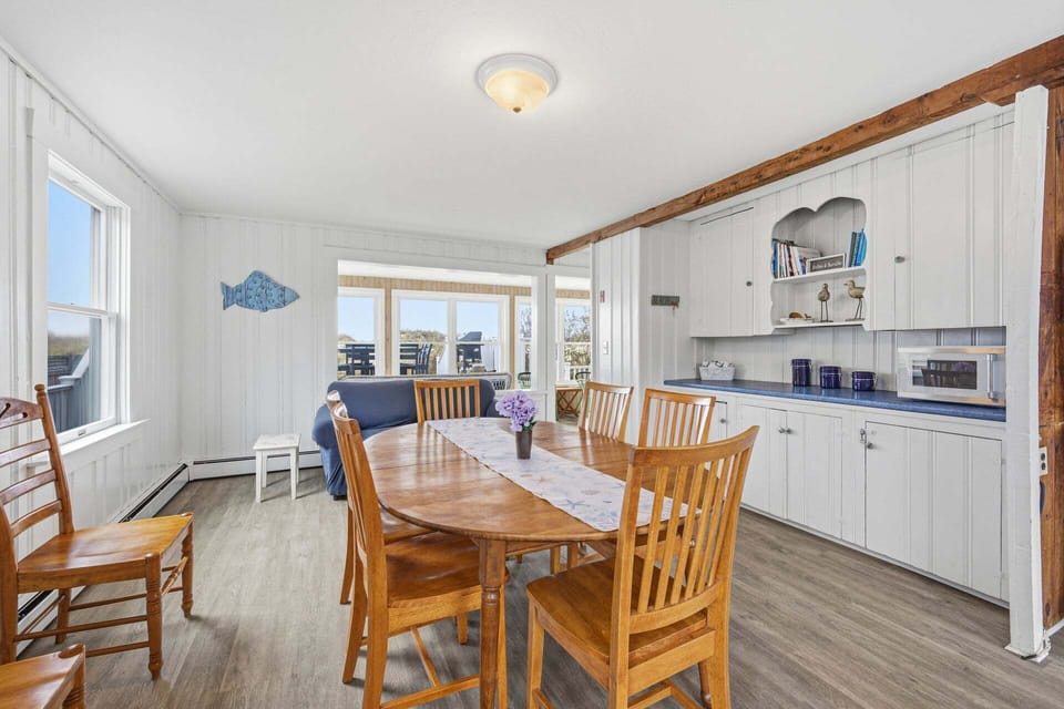 Dining table with extra seating, offering a comfortable and flexible space