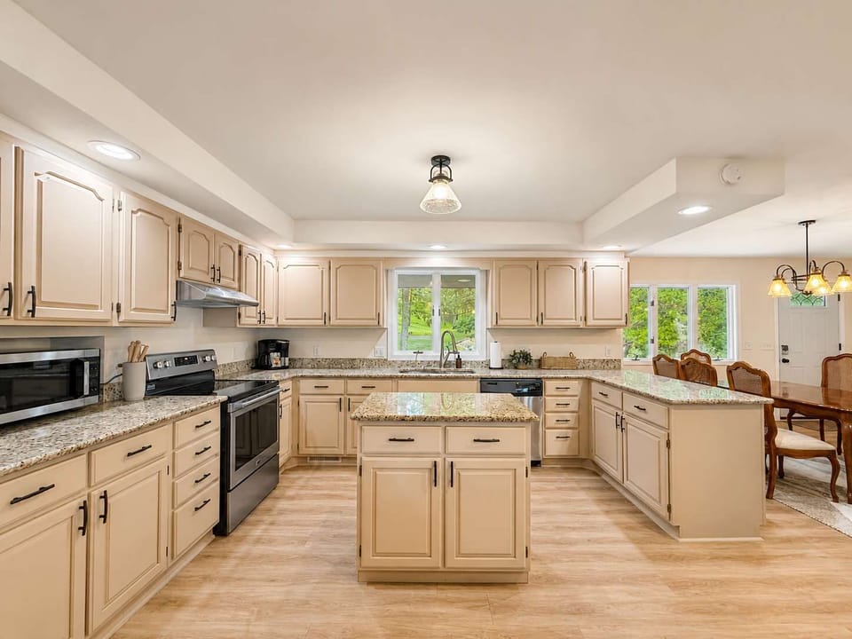 The main-level kitchen offers ample space & all the comforts of home​
