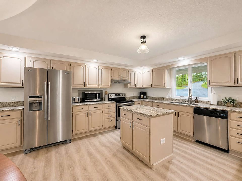 The main-level kitchen offers ample space & all the comforts of home​