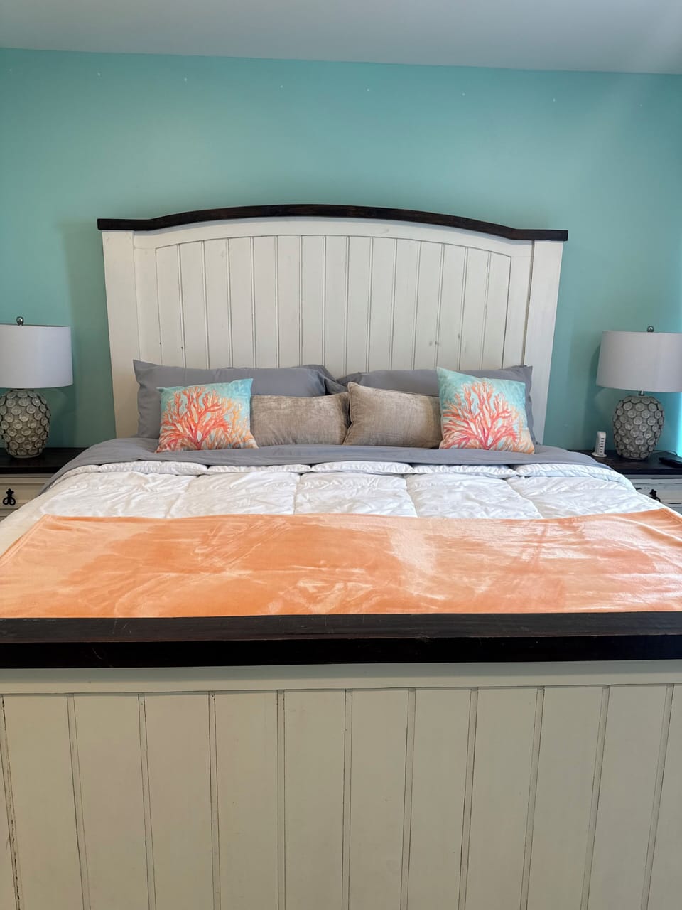 Coastal-inspired bedroom with king bed and bright, airy style