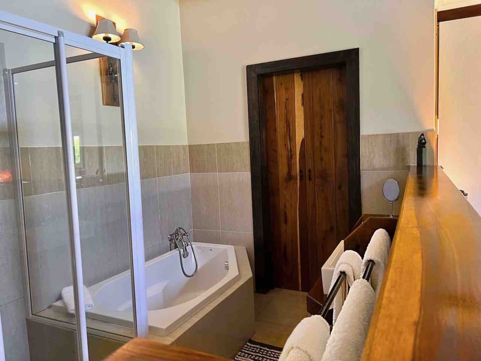 Luxury Double Room | Bathroom | Separate tub and shower, rainfall showerhead, hair dryer, towels