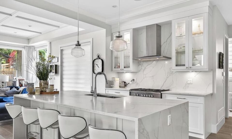 Gourmet Kitchen: Sleek marble counters and stylish seating for culinary adventures await!