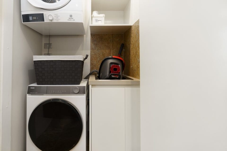 Convenient in-apartment laundry facilities make longer stays easy, with a washer, dryer and handy storage space.