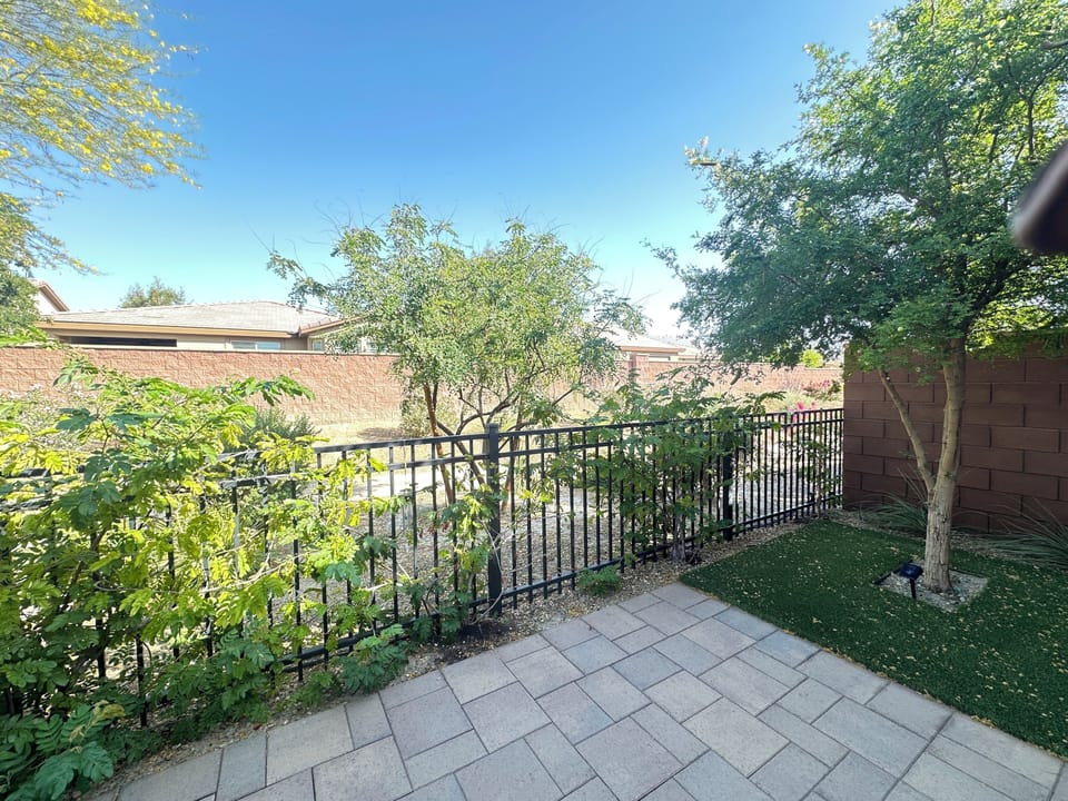 Rear patio backs to open space and walking trail