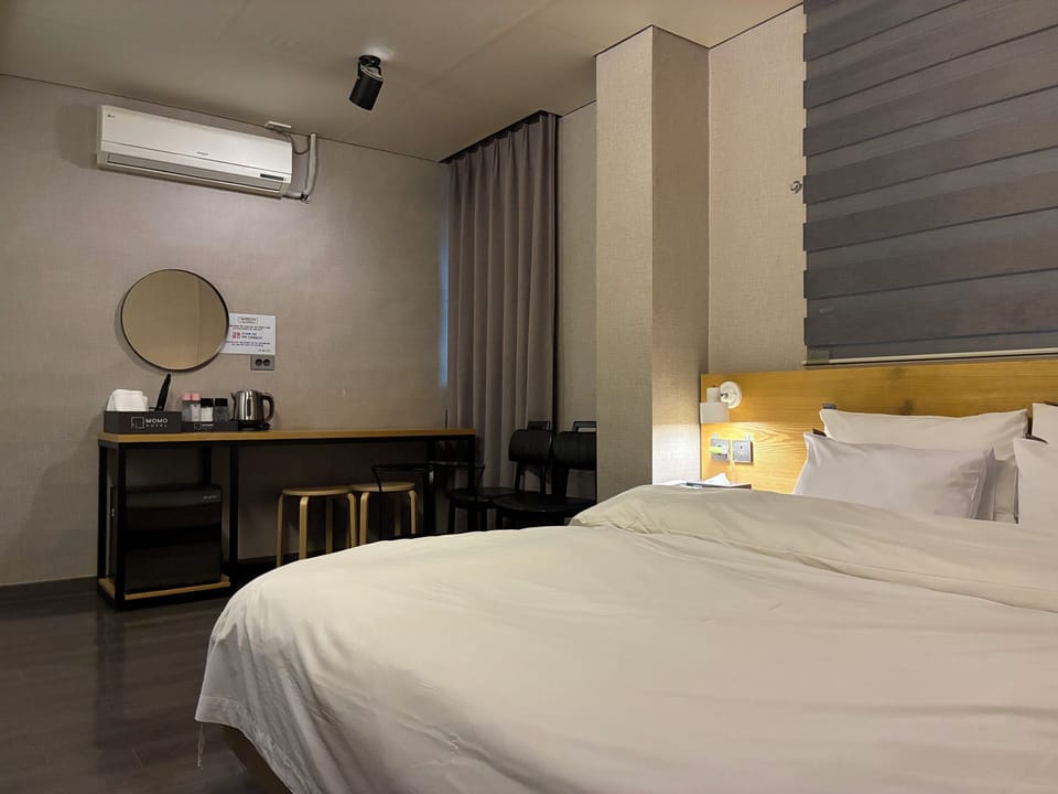Comfort Double Room, Non Smoking, City View | Desk, WiFi (free), bed sheets