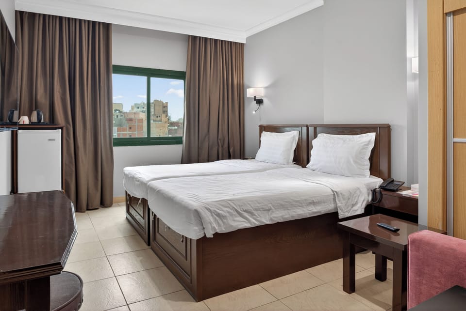 Deluxe Double or Twin Room, Mountain View | Desk, blackout drapes, iron/ironing board, free WiFi