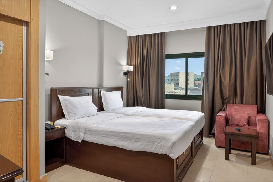 Deluxe Double or Twin Room, Mountain View | Desk, blackout drapes, iron/ironing board, free WiFi