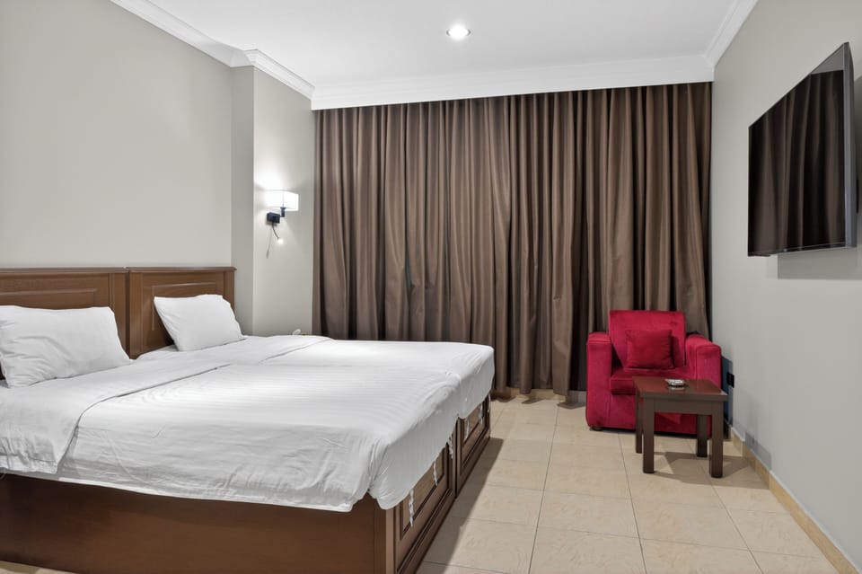 Deluxe Double or Twin Room, Mountain View | Desk, blackout drapes, iron/ironing board, free WiFi