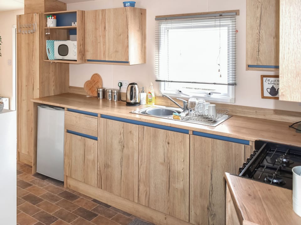 Open plan living space | Juniper Close 52 - Grand Coastal Retreats, Exmouth