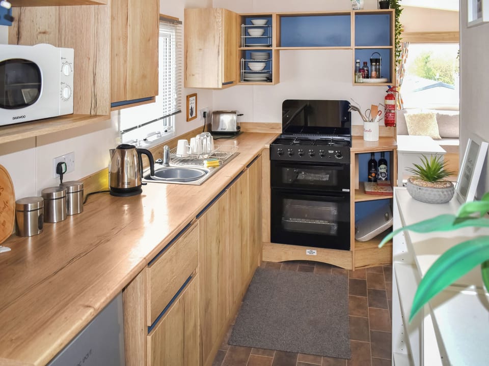 Open plan living space | Juniper Close 52 - Grand Coastal Retreats, Exmouth