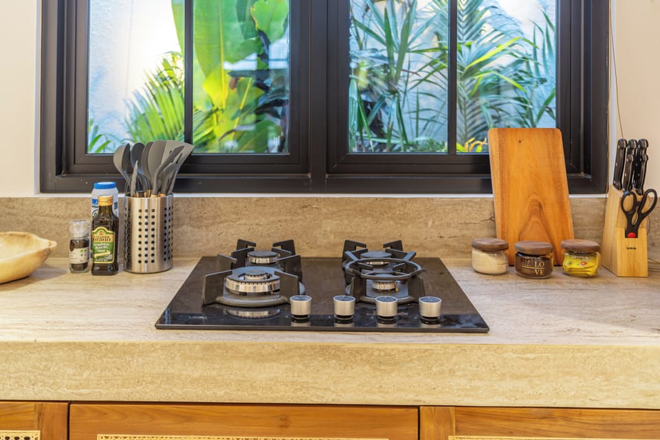 Luxury Villa, Pool View | Private kitchen | Coffee/tea maker, toaster, spices, eco-friendly cleaning products