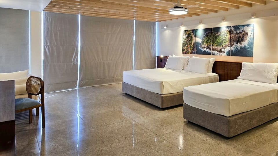 Deluxe Double or Twin Room, Balcony, Sea View | In-room safe, desk, laptop workspace, iron/ironing board