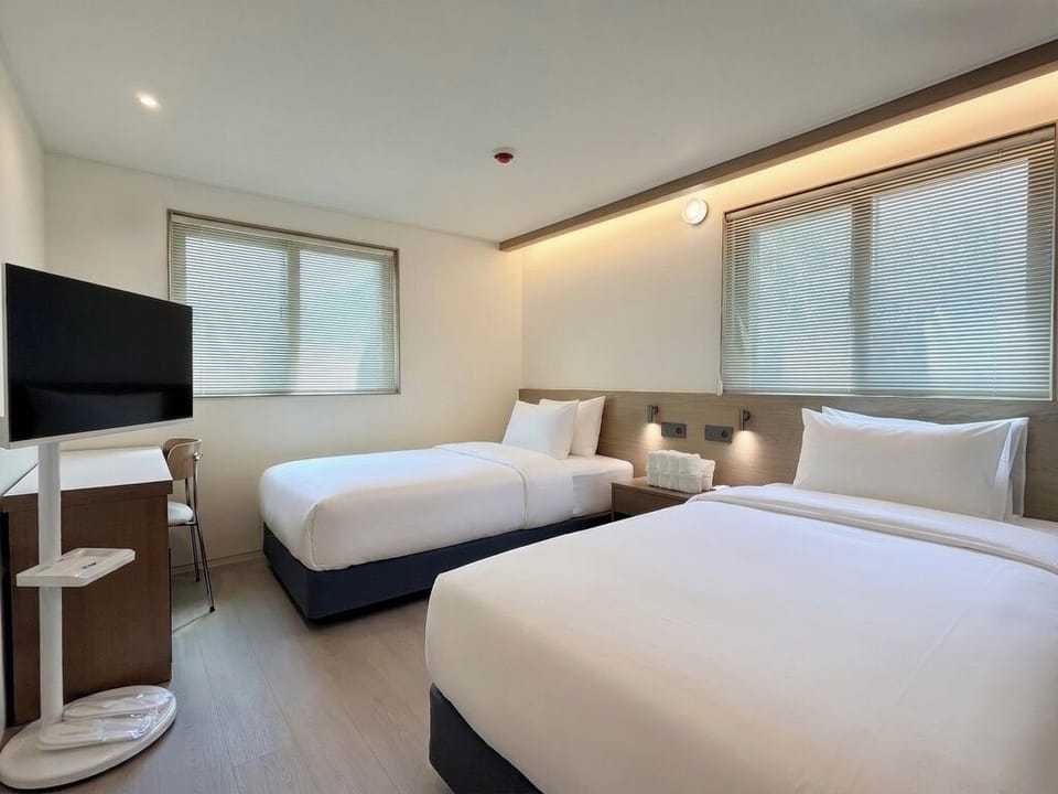 Down comforters, minibar (free items), desk, WiFi (free)