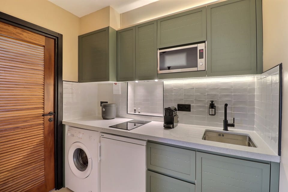Design Studio, Balcony, Partial Ocean View | Private kitchen | Espresso maker, coffee/tea maker, electric kettle