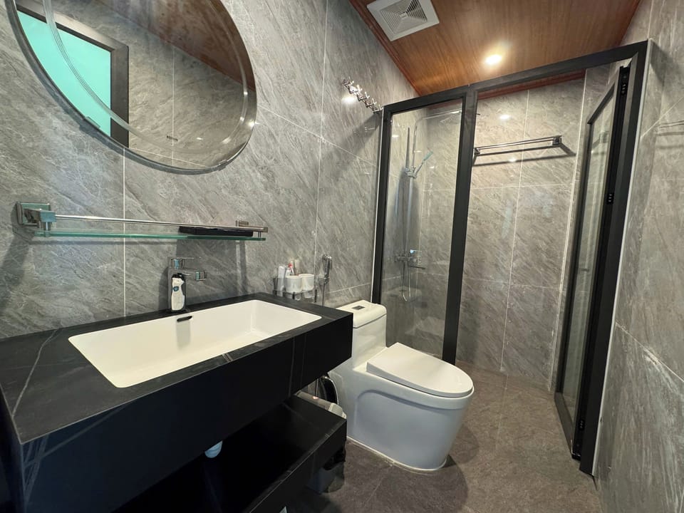 Rainfall showerhead, designer toiletries, hair dryer, bathrobes