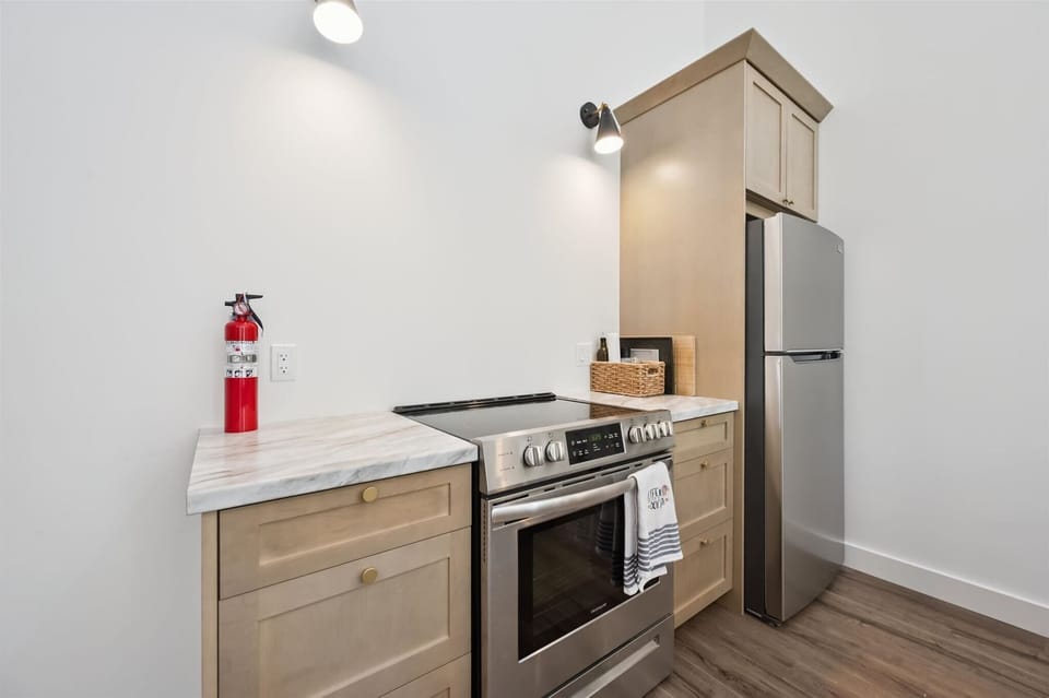 Modern kitchen stocked for everything from morning coffee to family dinners.