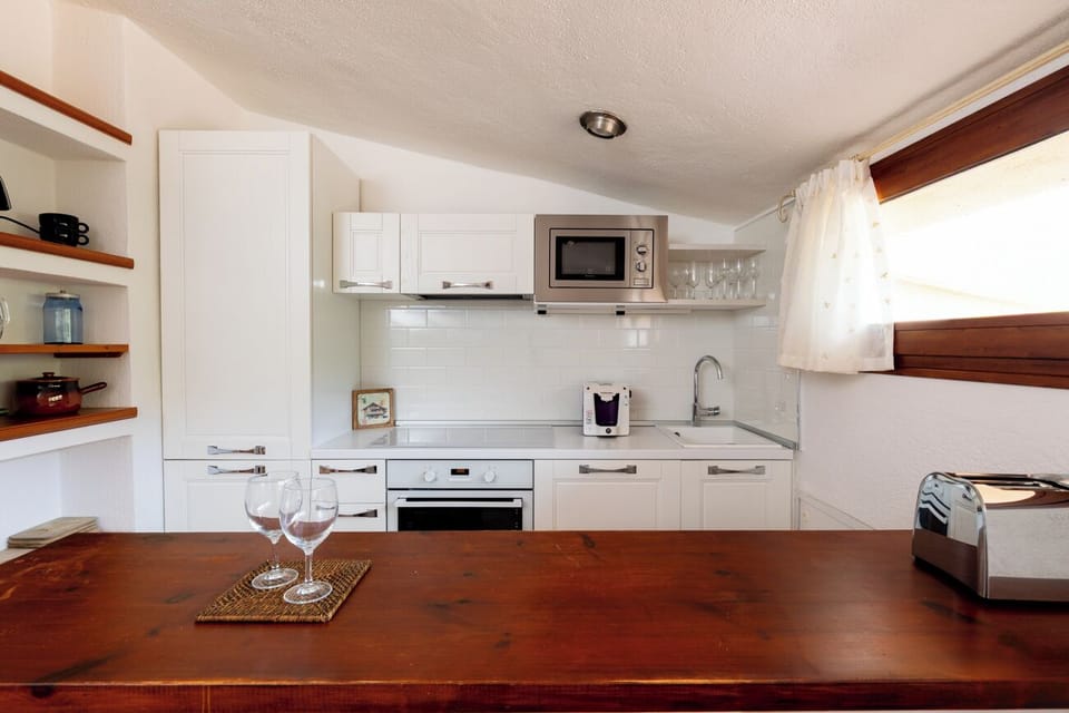 Duplex, Sea View | Private kitchen | Espresso maker, coffee/tea maker, electric kettle, highchair