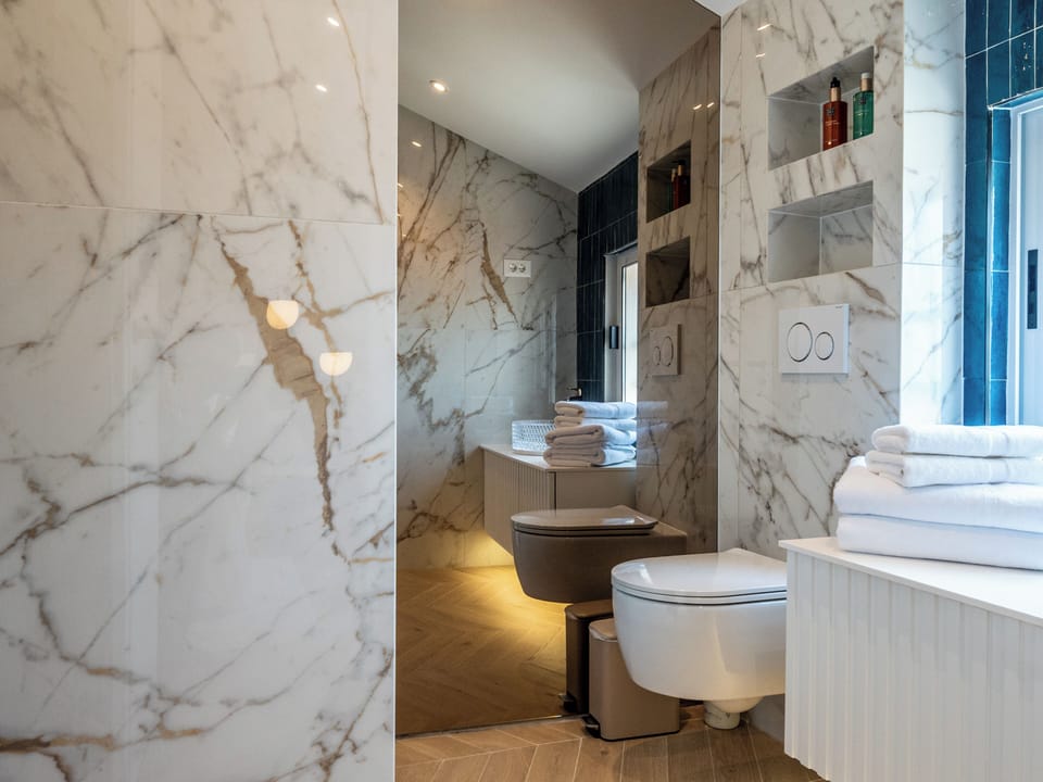 Superior Double Room, City View, Sea Facing | Bathroom | Slippers