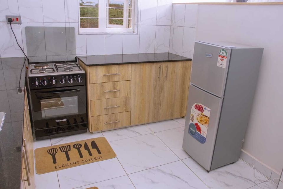 Deluxe Suite, Balcony, Park View | Private kitchen | Fridge, microwave, oven, stovetop