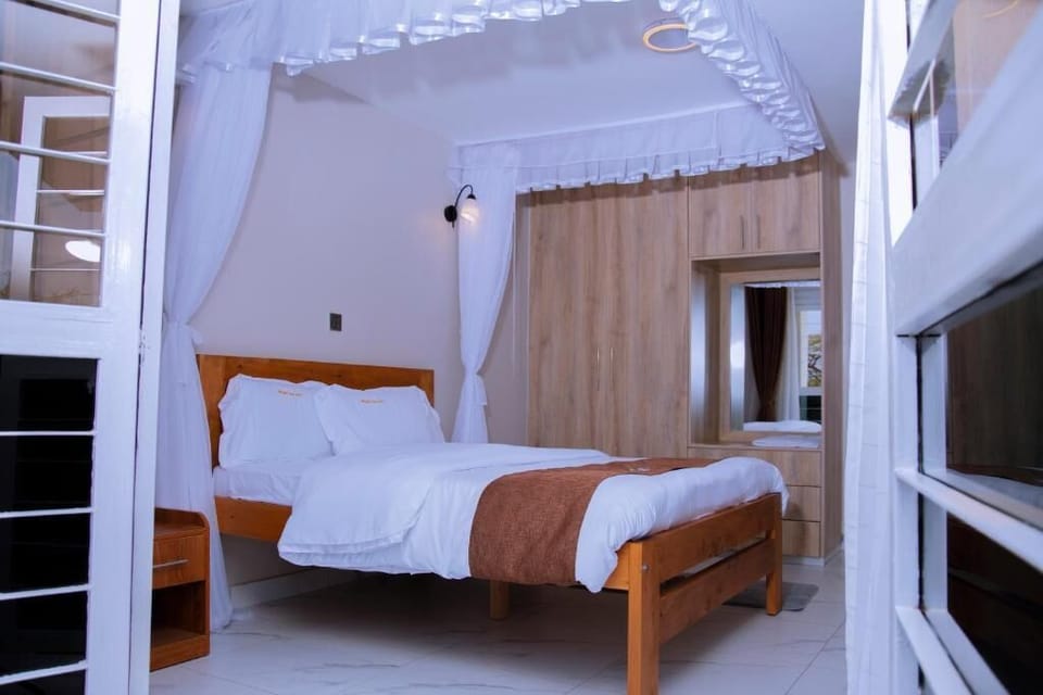 Premium bedding, memory foam beds, desk, laptop workspace