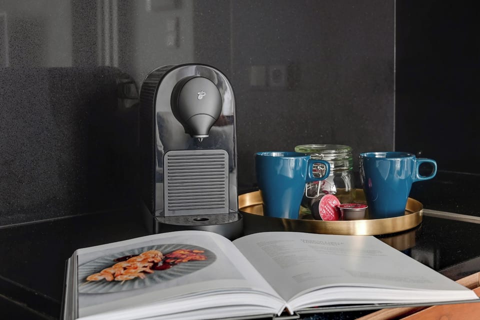 Deluxe Apartment, Balcony, Courtyard View | Coffee and/or coffee maker