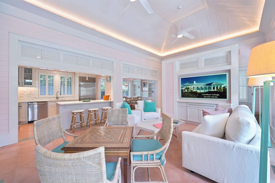 LIVING AREA OPENS TO ADJACENT KITCHEN AND DINING