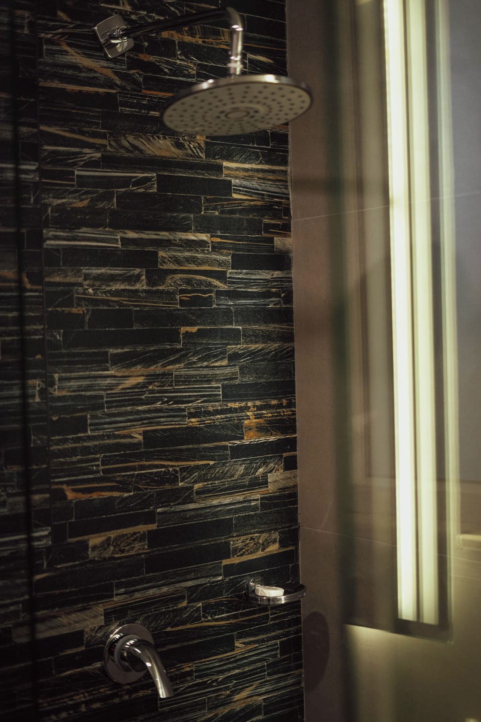 Shower, rainfall showerhead, free toiletries, hair dryer